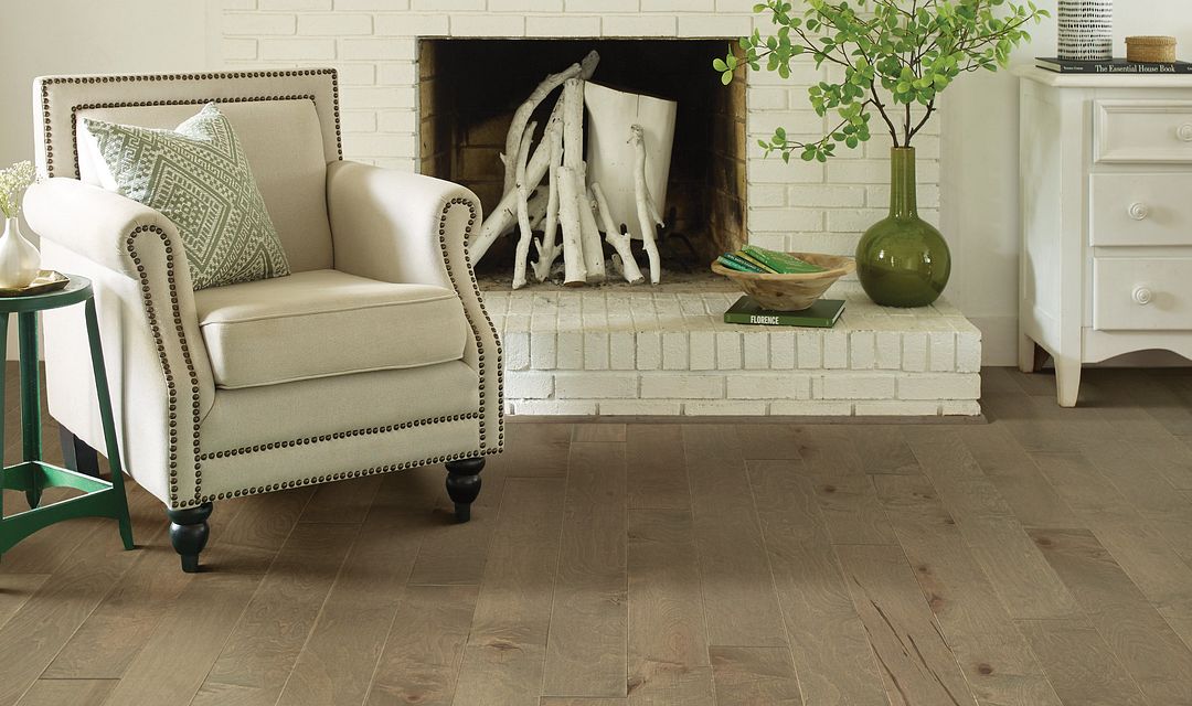 livingroom hardwood in livingroom with white fireplace mantle